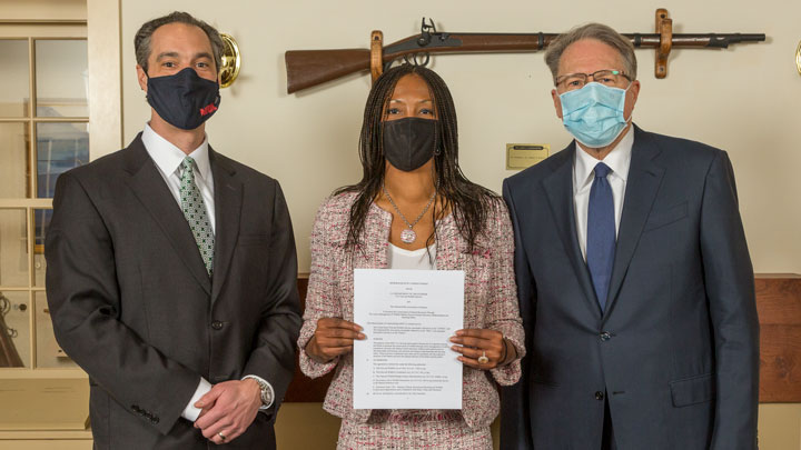 .S. Fish and Wildlife Service Director Aurelia Skipwith, center, flanked by NRA-ILA Executive Director Jason Ouimet, left, and NRA Executive Vice President and CEO Wayne LaPierre upon signing a memorandum of agreement