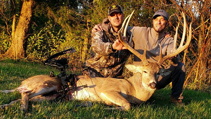 Ohio hunter brothers pose with whitetail buck