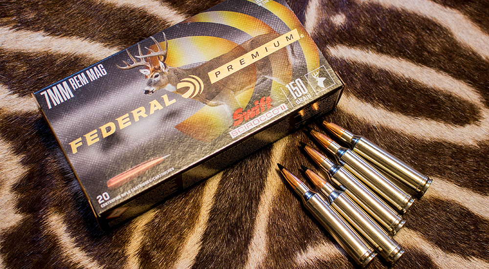 Federal Premium 7mm Remington Magnum ammunition on zebra rug.