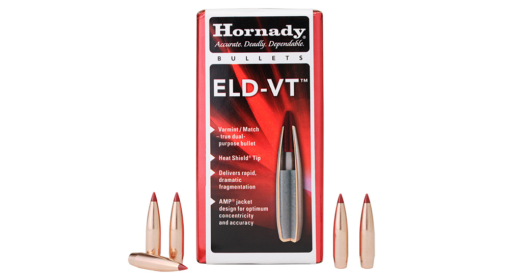 Hornady ELD-VT ammunition box with five bullets standing beside on white background.