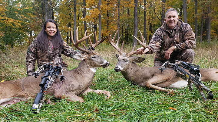 Father and 15-year-old daughter with whitetail bucks taken in Minnesota within 20 minutes of each other.