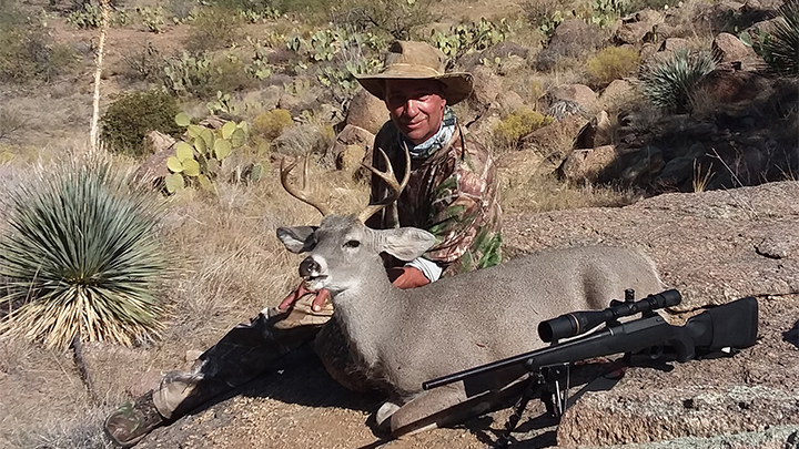 Hunter with Coues deer in Arizona