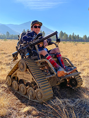 Disabled hunter with Action Trackchair