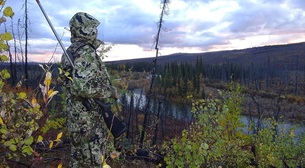 Hunter on mountain top wearing Sitka Subalpine camouflage.