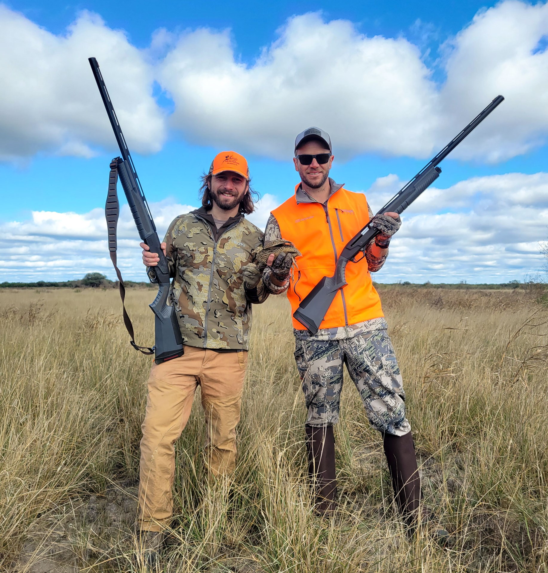 Hunters with perdiz