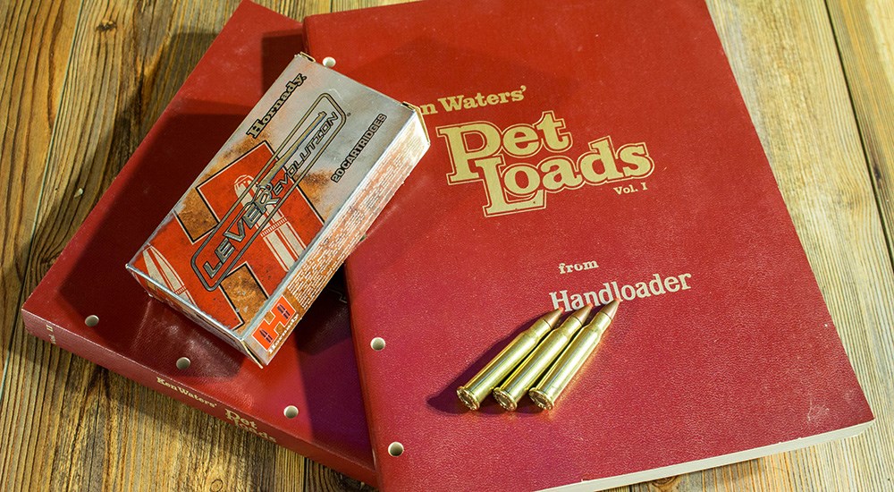 Ken Waters Pet Loads Volume I book with Hornady 7-30 Waters ammunition laying on the cover.