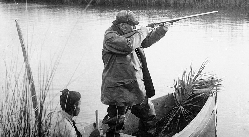 Former U.S. president Grover Cleveland waterfowl hunting from boat