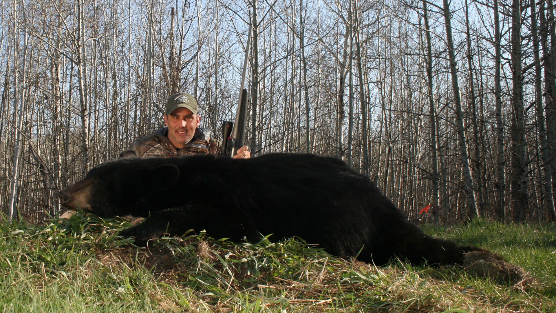 Hunter with Black Bear