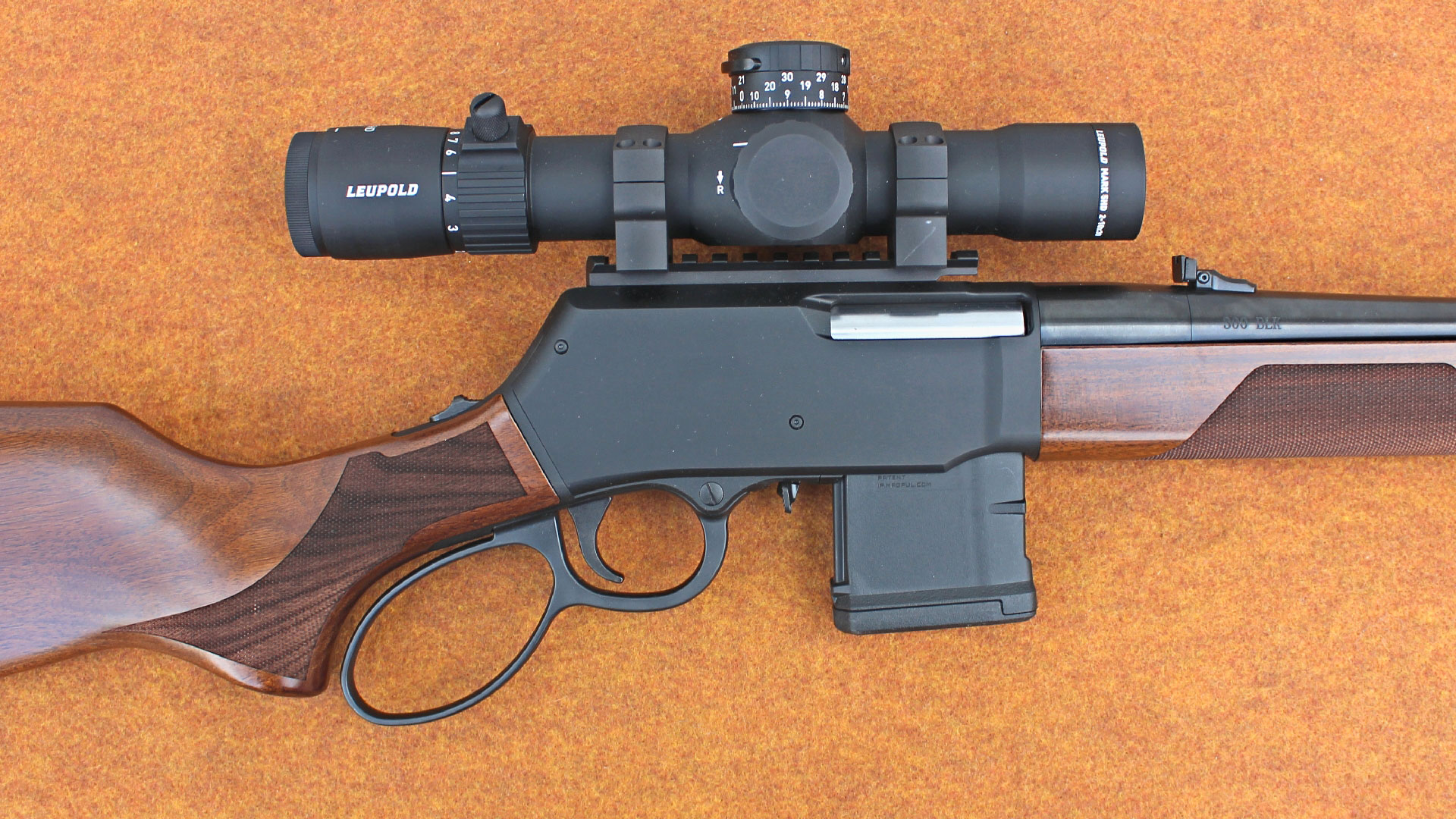 The aluminum receiver’s magazine well is sized for AR-15 magazines.