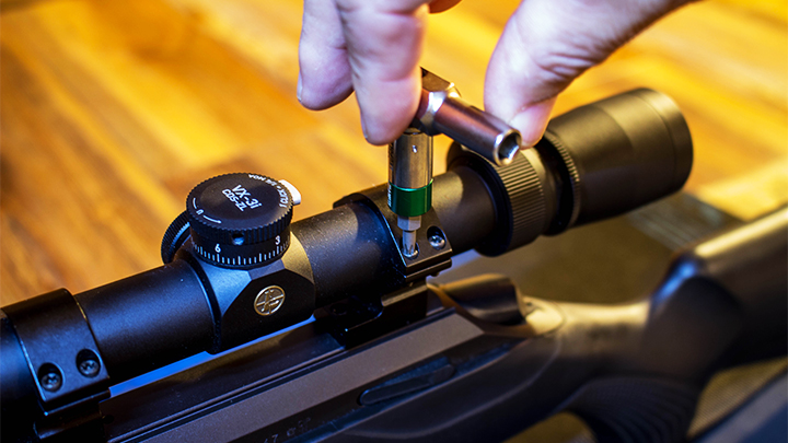 Hunter Torquing Screws on Scope Mount