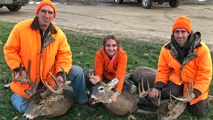 Three generations of hunters with Wisconsin bucks