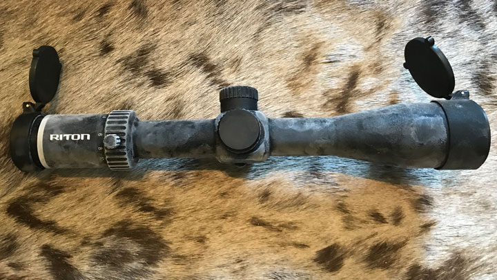 Frozen Riton scope sitting on a hide