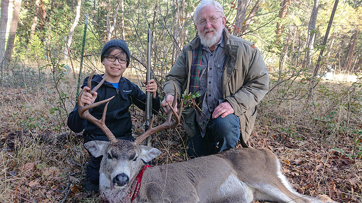 Father and son with whitetail deer taken in California