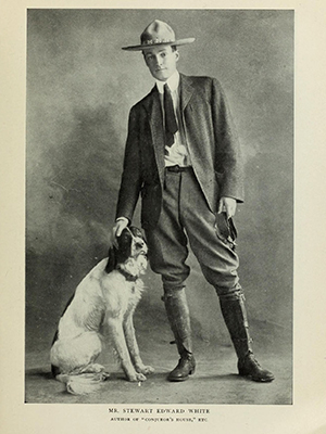 Author Stewart Edward White with dog
