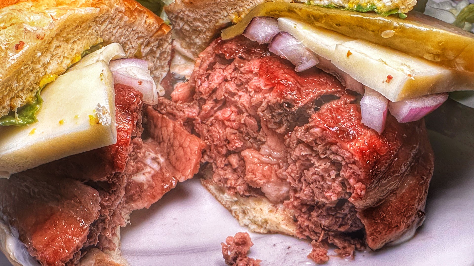 Bacon rolled elk burgers
