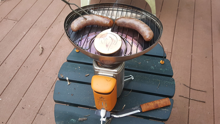 CampStove 2 cooking a pair of brats