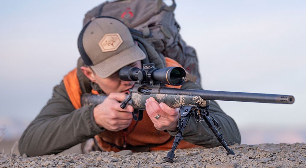 Man Shooting Christensen Arms Ridgeline FFT Bolt-Action Rifle