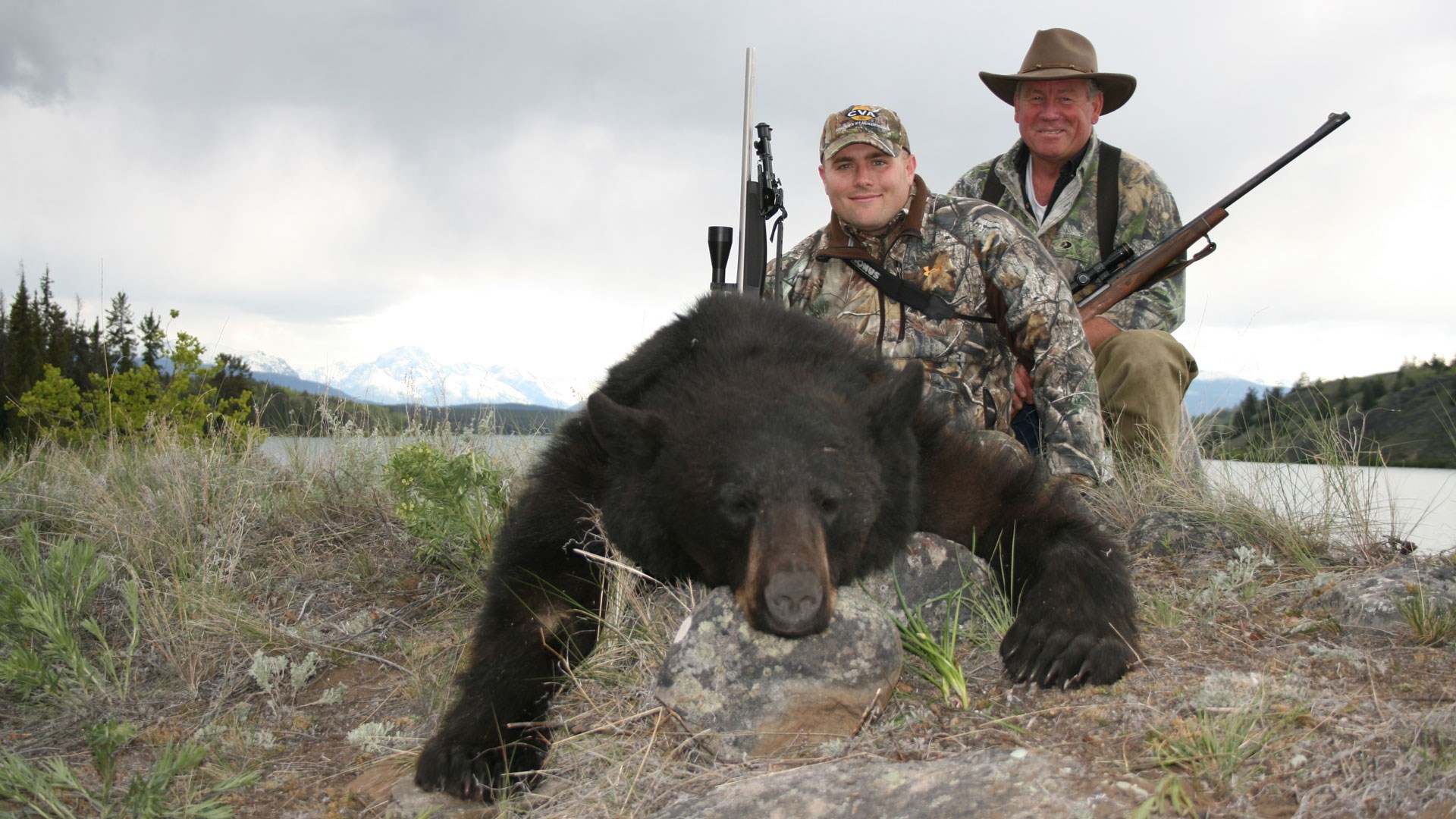 Hunters with black bear