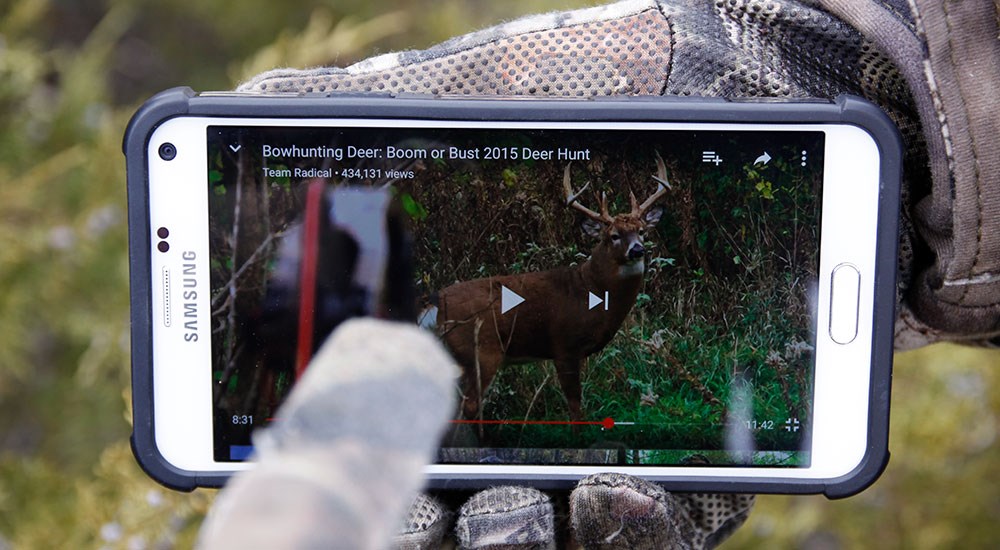 Picture of Deer Hunting Video Playing on Cell Phone Screen