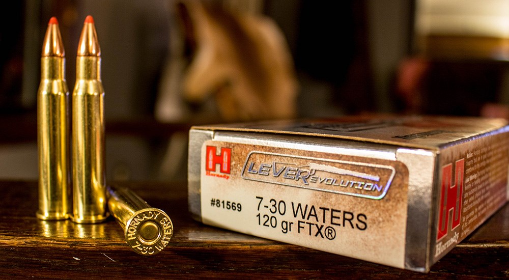 Henry LEVERevolution 7-30 Waters 120-grain FTX ammunition on wood table.