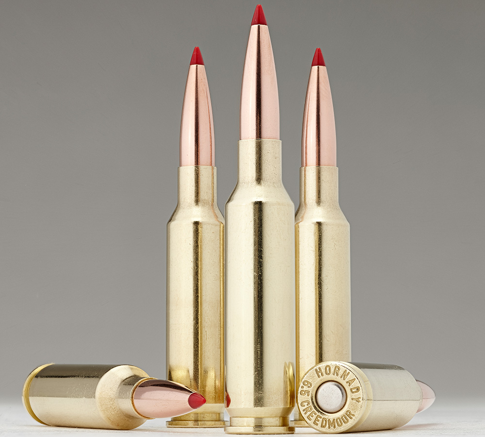 Hornady 6.5 Creedmoor ammunition on gray background.