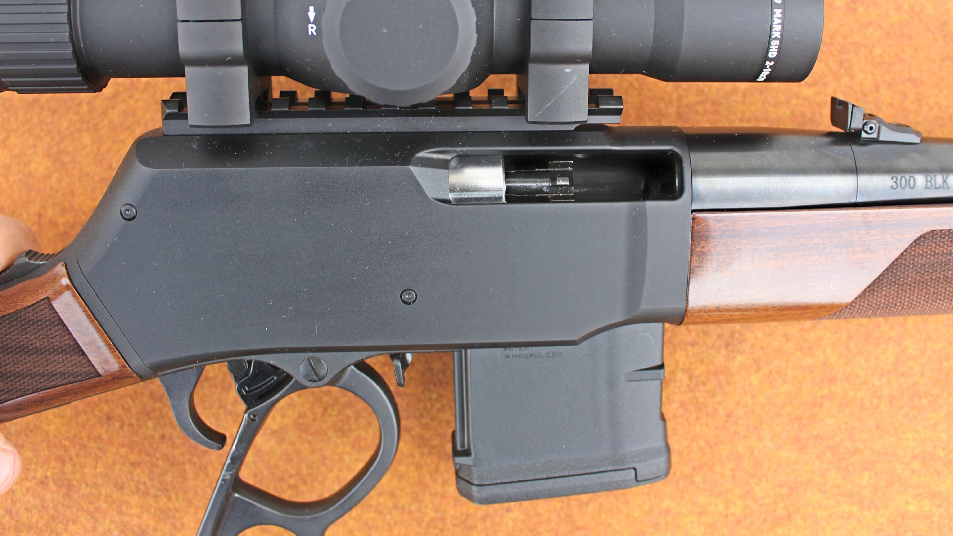 The rotating multi-lug bolt is also borrowed from the AR-15.