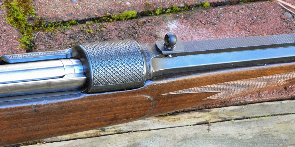 Peep sight installed on rifle.