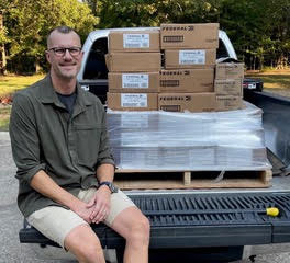 Tom with sweepstakes winnings