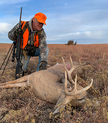 Hunter with public land buck