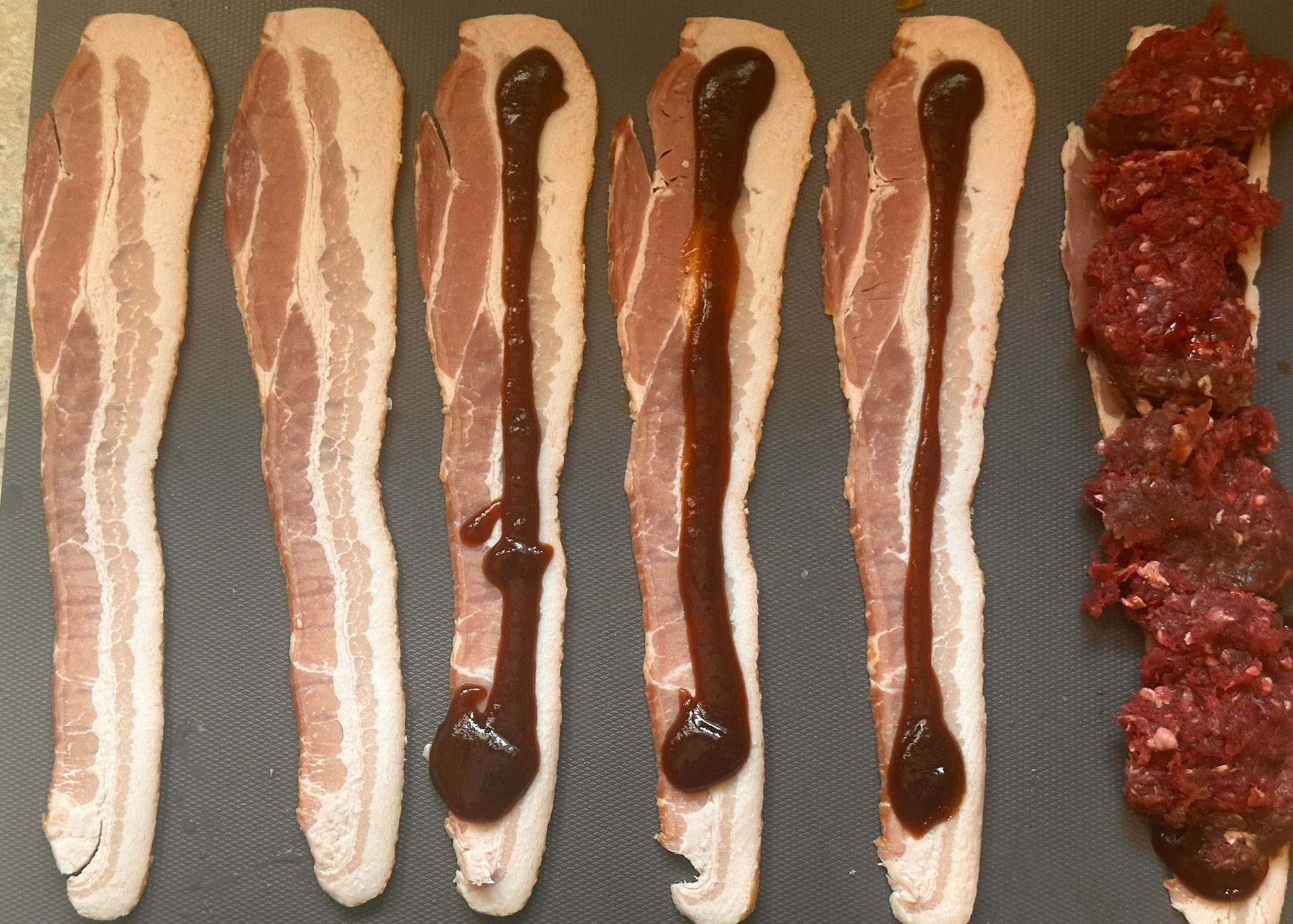 Bacon rolled elk burgers
