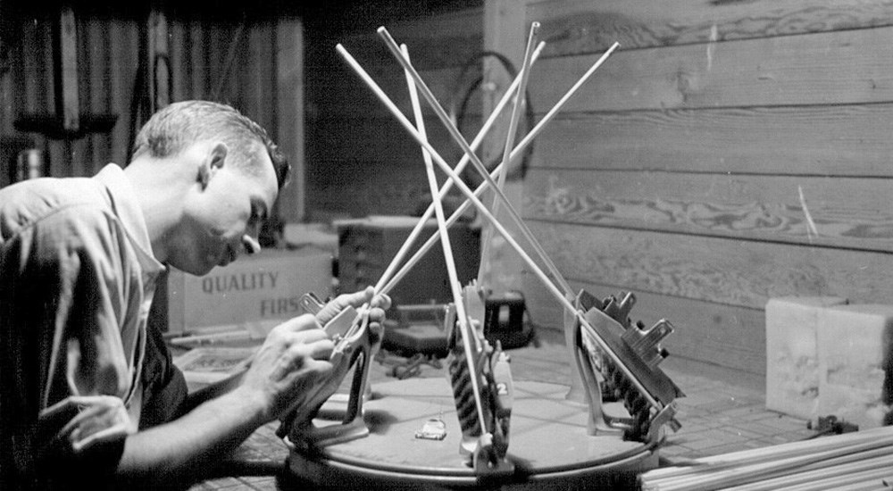 Easton Archery founder, Doug Easton, building hunting arrows in his garage.