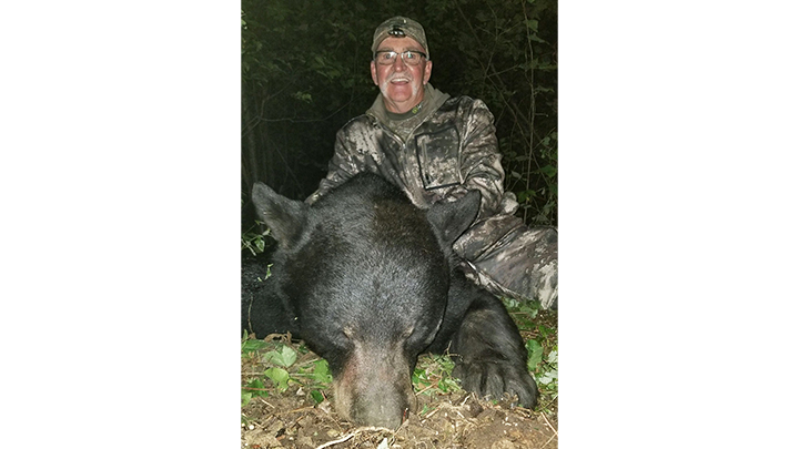 Hunter with Black Bear taken in Wisconsin