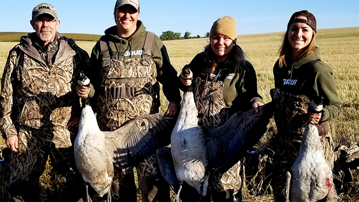 Goose hunters with Canada geese