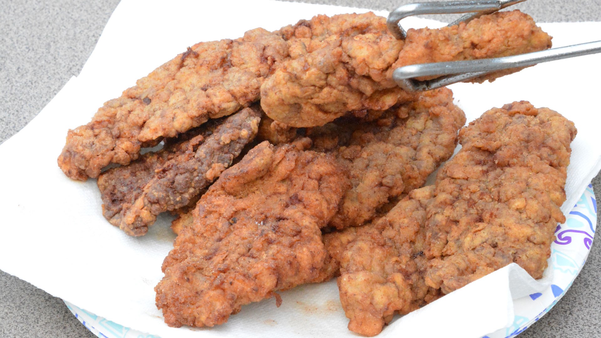Chicken fried venison in paper