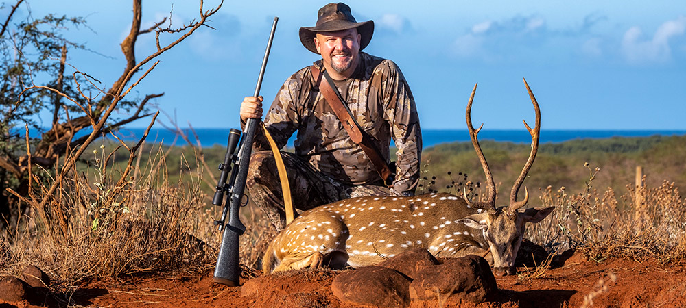 Hunter in Hawaii with Axis Deer