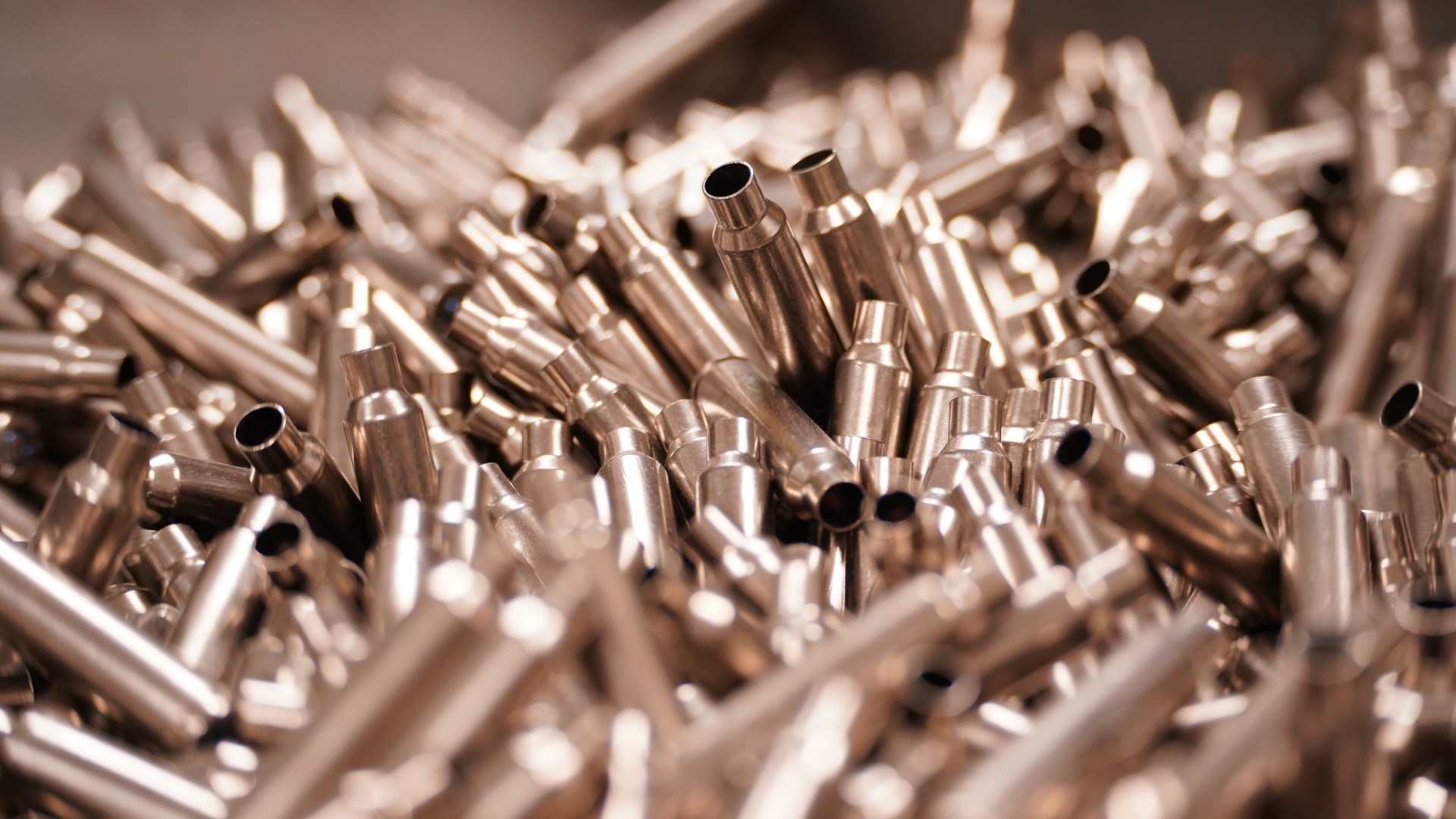 7mm Backcountry Peak Alloy steel cases in a pile silver metal tubes