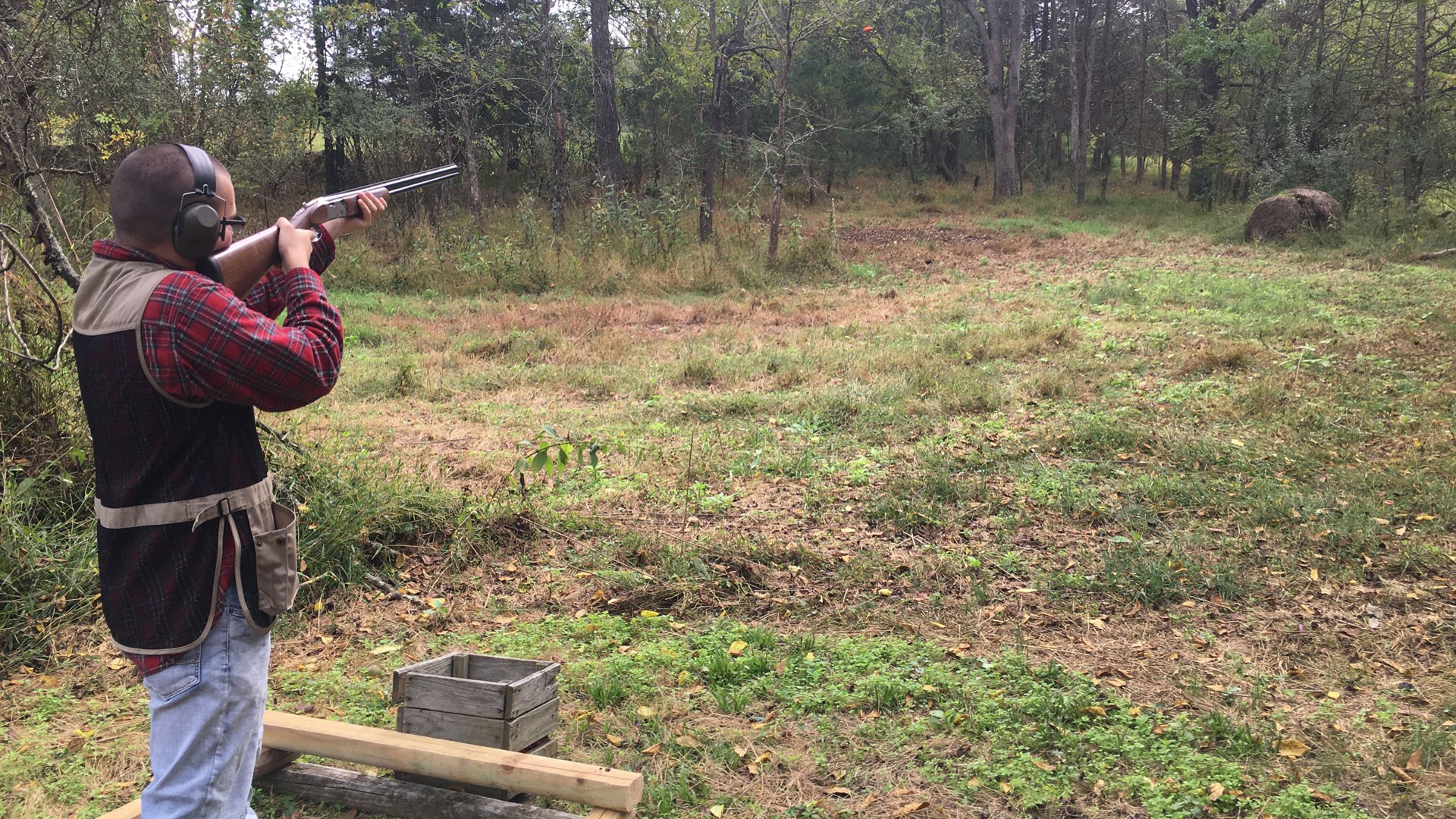 Shooting a clay pigeon in flight