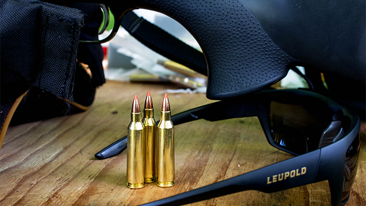 .22-250 Remington ammunition on shooting bench