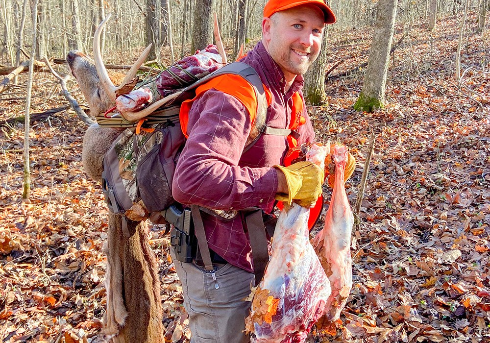 Hunter Packing out Whitetail Deer Meat