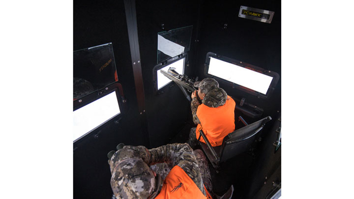 Two hunters in hawk double down box blind