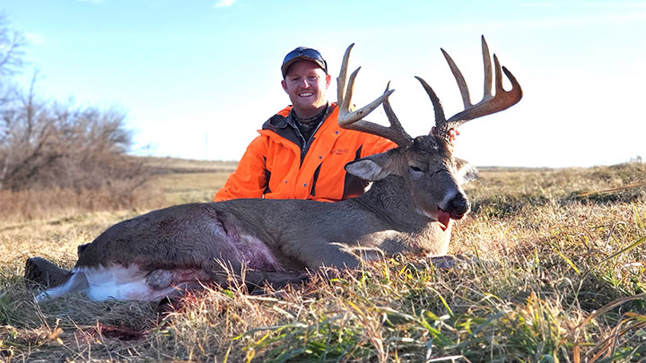 Hunter with Big Whitetail Buck in Wisconsin