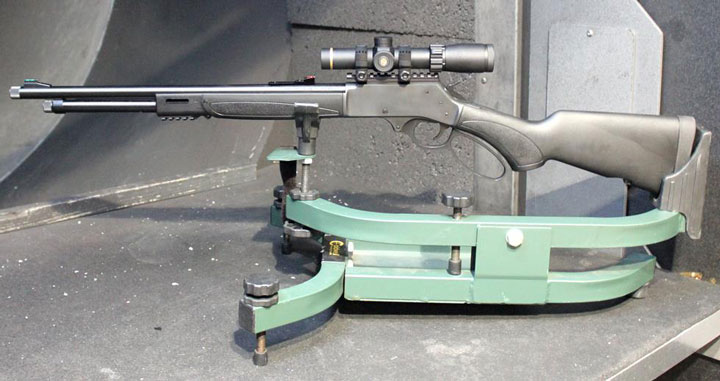 Henry X Model on the range, sitting in a bench rest with the scope mounted.