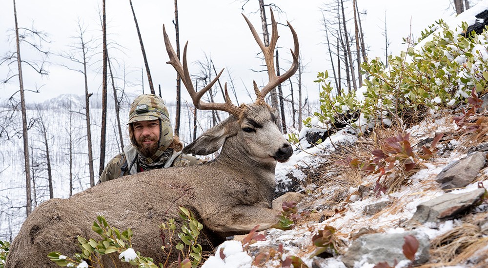 Hunter with Idaho mule deer