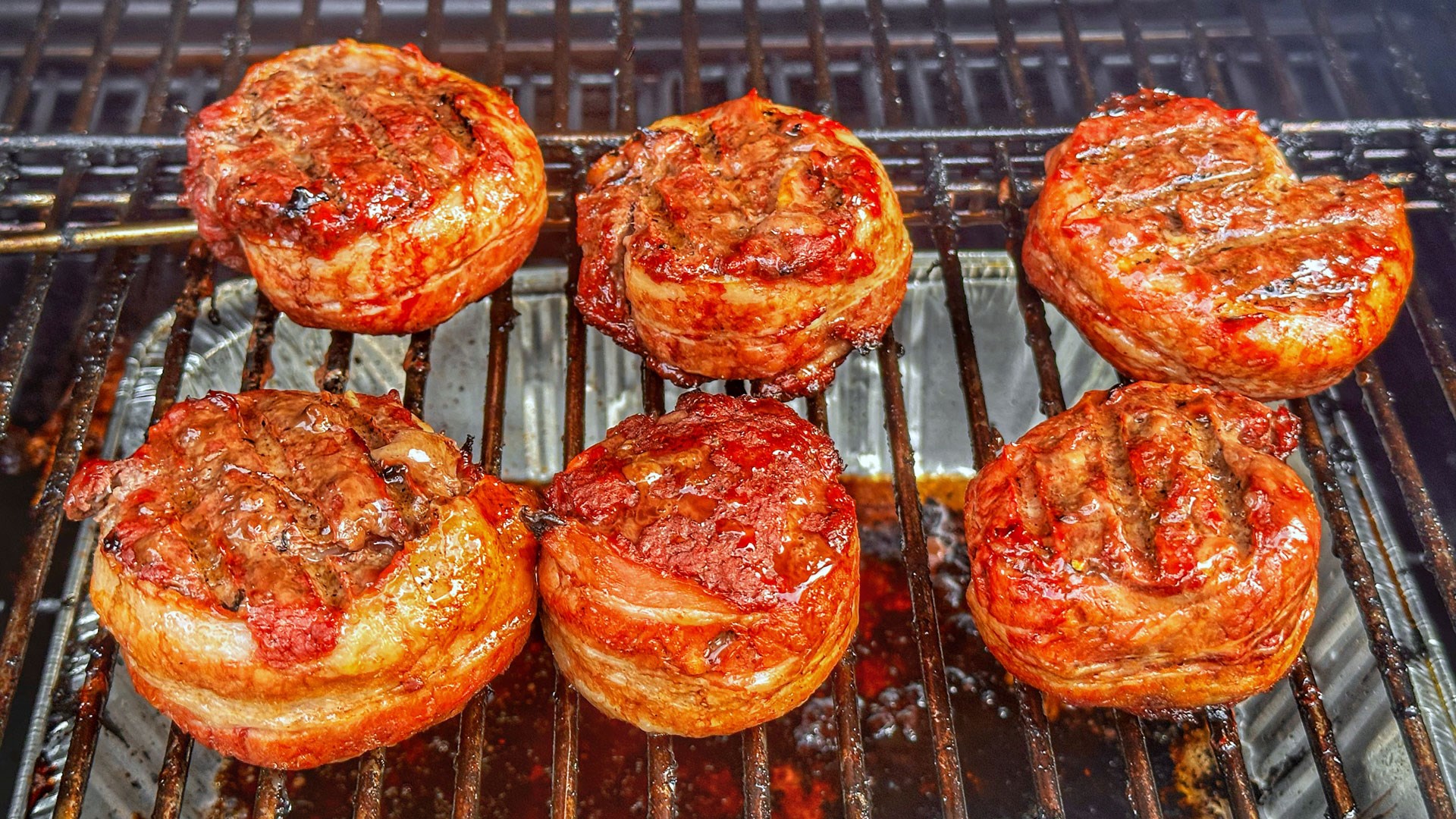 Bacon rolled elk burgers