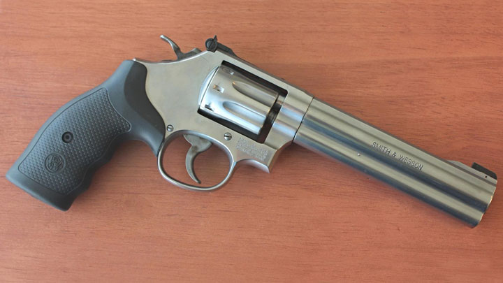 Smith and Wesson 648 on red table