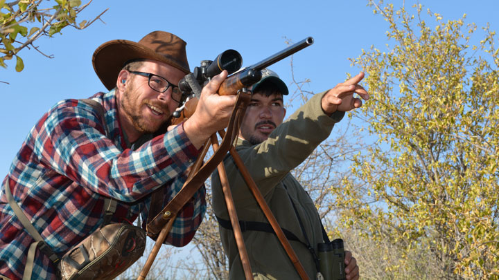 The author listens to a professional hunter when lining up a shot