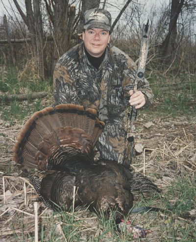 Bowhunter with bird