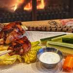 Upland Bird Lollipops In Front Of Fireplace