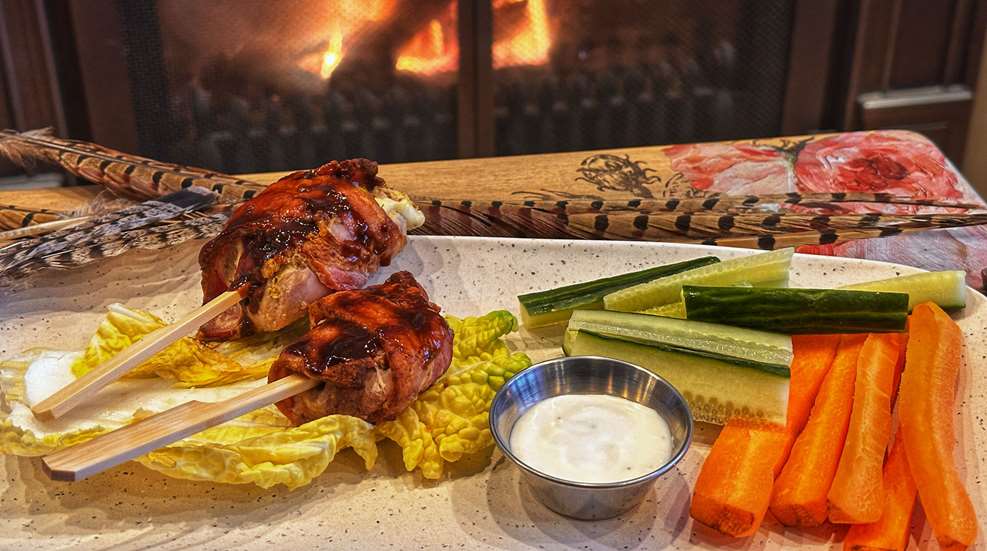 Upland Bird Lollipops In Front Of Fireplace