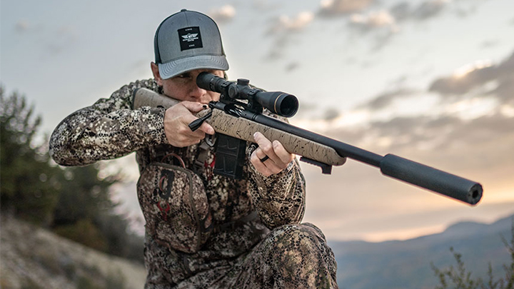 Hunter Using Christensen Arms Ridgeline Scout Rifle on Top of Mountain